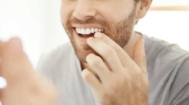 Comment stabiliser une dent qui bouge ?